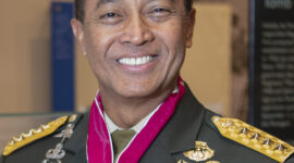 Karen Durham-Aguilera (left), executive director, Arlington National Cemetery and Army National Military Cemeteries; and Indonesian Army Chief of Staff Gen. Andika Perkasa (right) exchange gifts in the Memorial Amphitheater Display Room at Arlington National Cemetery, Arlington, Virginia, Jan. 30, 2020. Perkasa participated in an Army Full Honors Wreath-Laying Ceremony at the Tomb of the Unknown Soldier and toured the Memorial Amphitheater Display Room. (U.S. Army photo by Elizabeth Fraser / Arlington National Cemetery / released)
