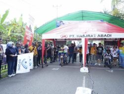 Kepala BP2MI Benny Rhamdani Buka Drag Bike di Kotamobagu Sulawesi Utara , sosialisasikan “Stop Human Trafficking”