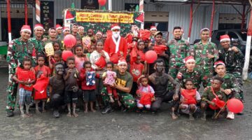 Satgas Yonif 715/Mtl Rayakan Natal Bersama Masyarakat Puncak Jaya Papua Tengah